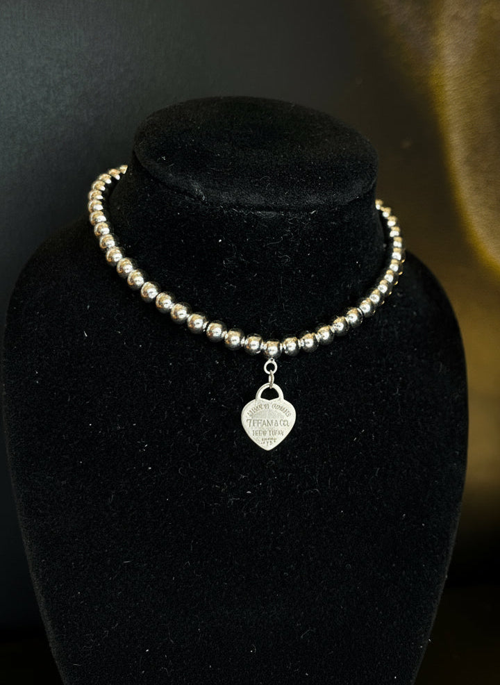 Pulseira bolinha coração