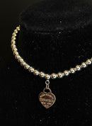 Pulseira bolinha coração