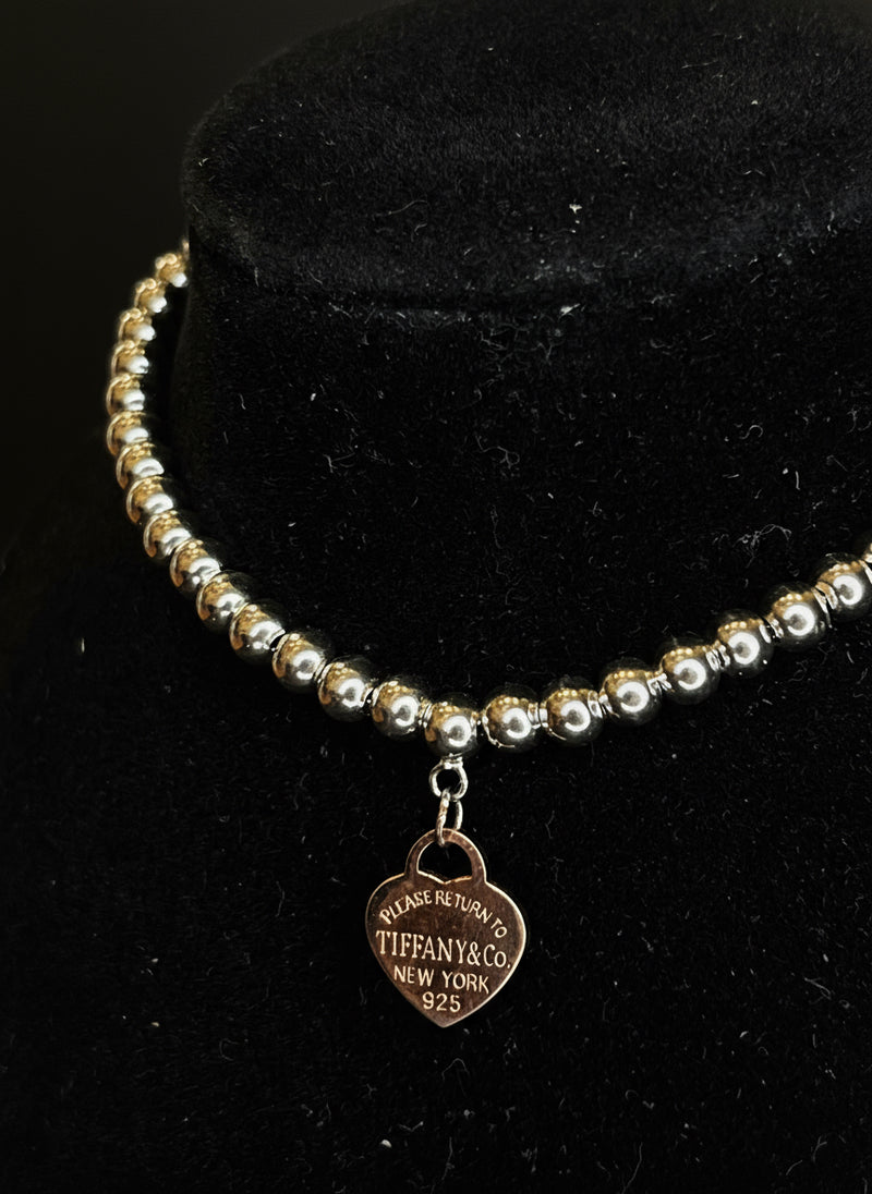 Pulseira bolinha coração